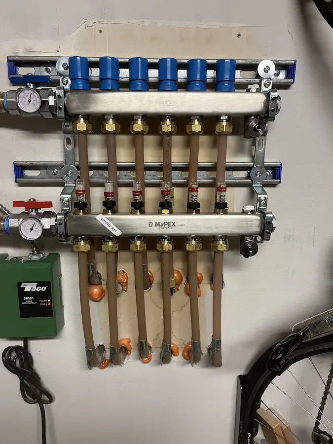 Plumber performing Water Heater Repair at a residential property in Kenneth City